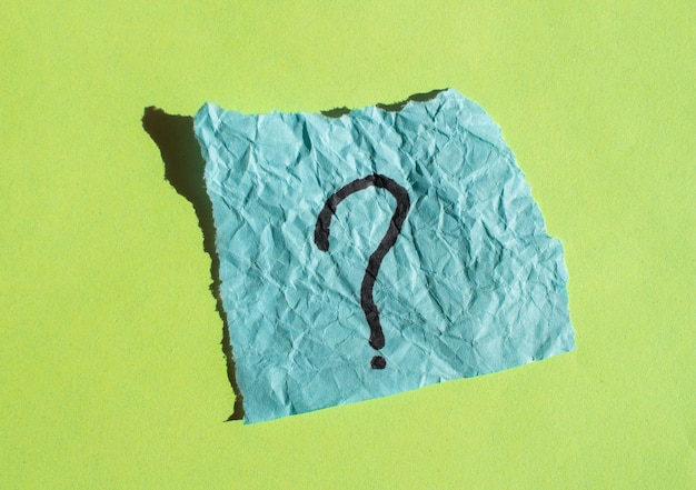 A piece of paper with a question mark on it