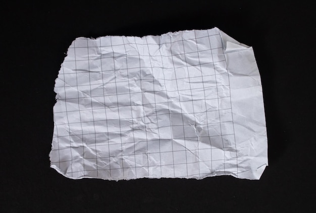 A piece of paper with a square grid on it