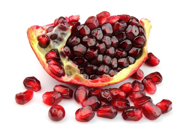 Piece of pomegranate on white background