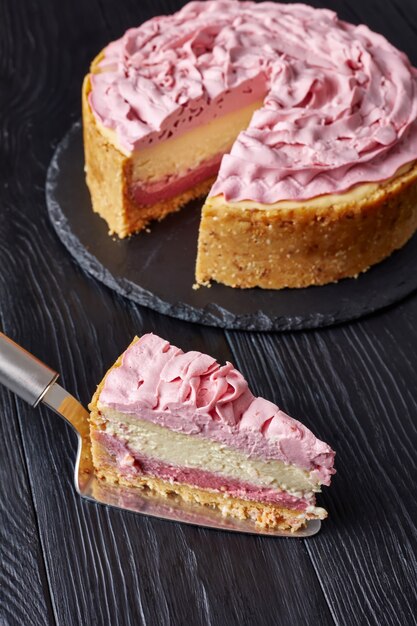 piece of raspberry cheesecake on a cake shovel