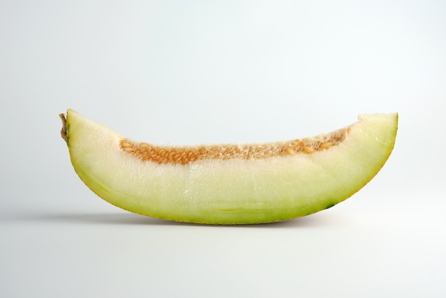 Piece of ripe melon with seeds 