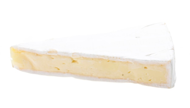 A piece of soft brie cheese