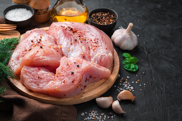 Piece of turkey fillet on a cutting board