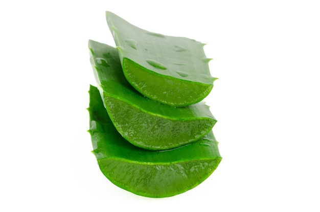 Pieces of aloe vera leaf on white background