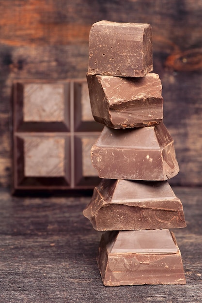 Pieces and bar of dark chocolate