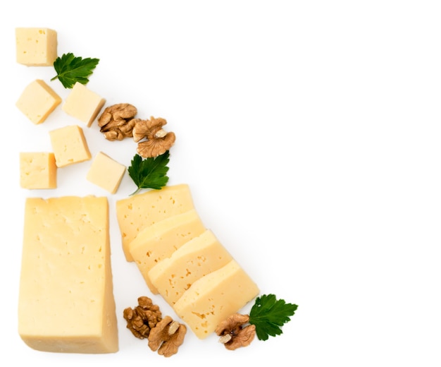 Pieces of cheese, walnuts and parsley