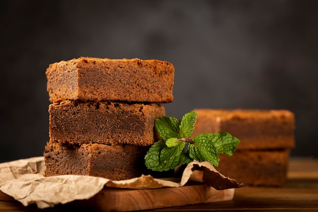 Pieces of chocolate brownies on the table