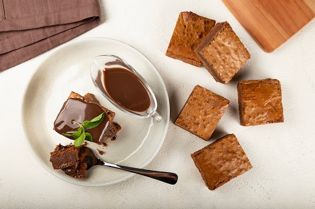 Pieces of chocolate brownies on the table