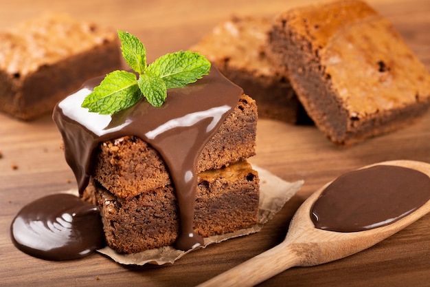 Pieces of chocolate brownies on the table