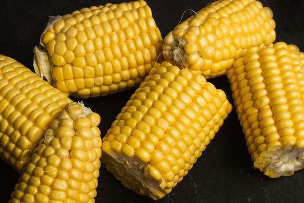 Pieces of corns on a dark background