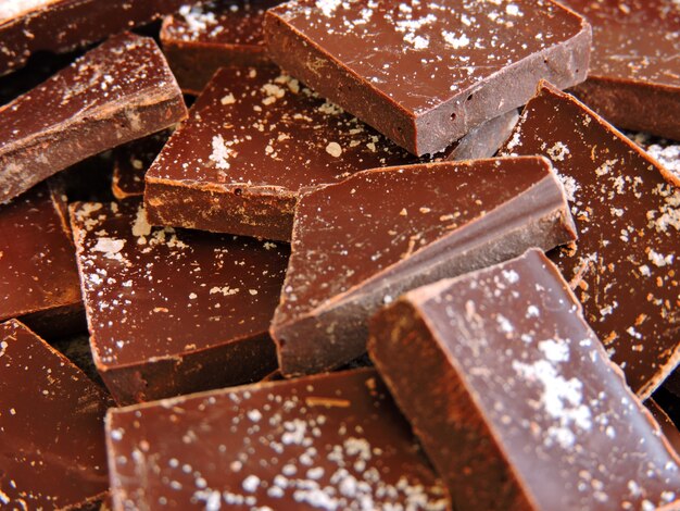 Pieces of dark chocolate with sea salt