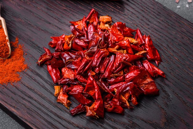 Pieces of dried paprika preparation of powder spice for various dishes