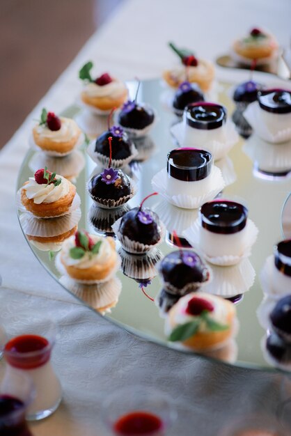 Pieces of tasty cakes served on layered dish