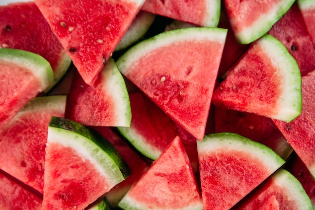 Pieces of watermelon on a wooden table close up