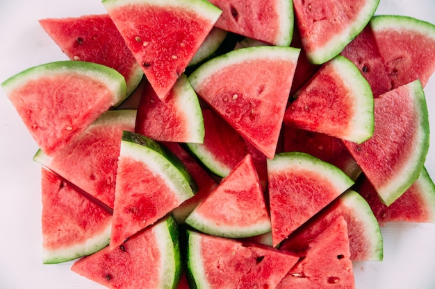 Pieces of watermelon on a wooden table close up