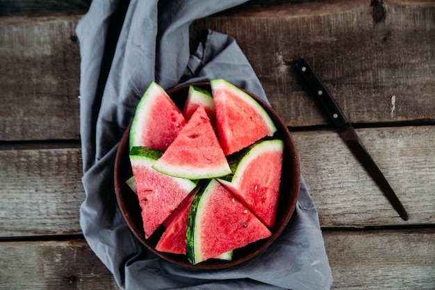 Pieces of watermelon on a wooden table close up