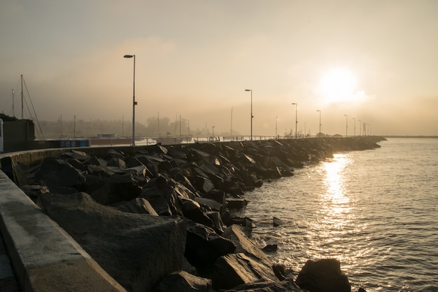 A pier in a foggy morning.