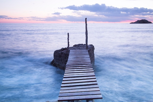 Pier at Hort Cove Beach Ibiza Spain