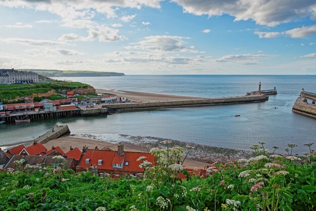 Pier in North Sea at Whitby of North Yorkshire, the UK. Whitby is a seaside port and town on the coast of the river Esk.