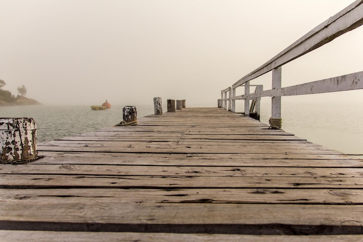 Photo pier over sea against clear sky