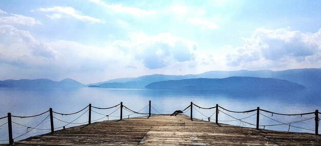 Photo pier over sea against sky