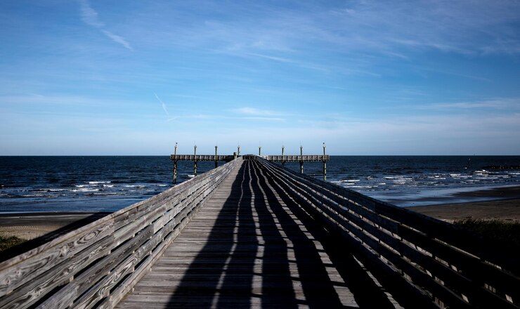 Photo pier over sea against sky