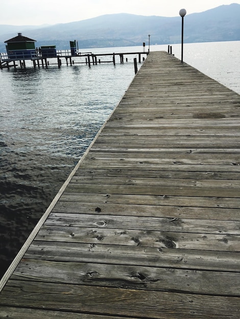 Photo pier over sea against sky