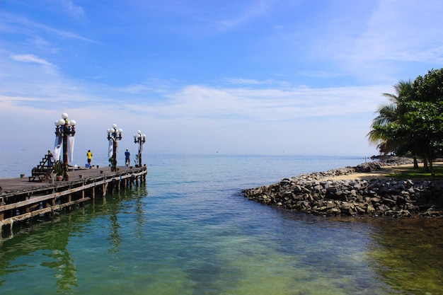 Pier over sea against sky