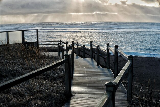 Photo pier over sea against sky