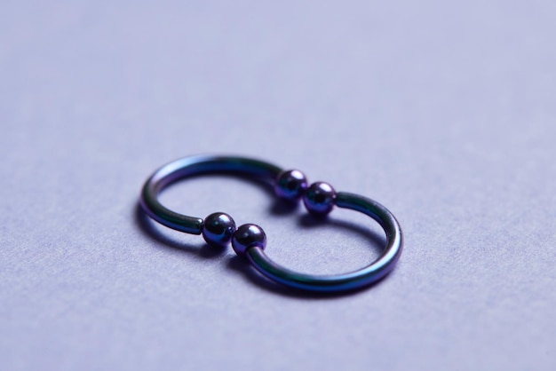 Piercing earrings closeup On a black background