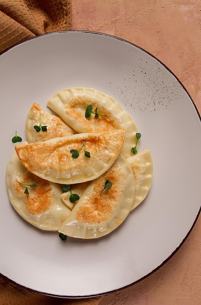 Pierogi a traditional dish of Polish cuisine dumplings top view closeup no people