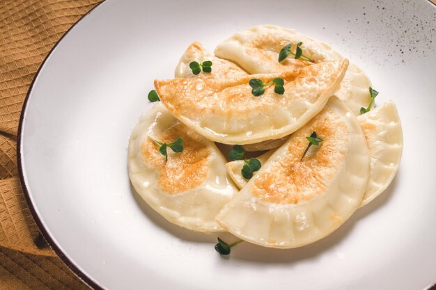 Pierogi a traditional dish of Polish cuisine dumplings top view closeup no people