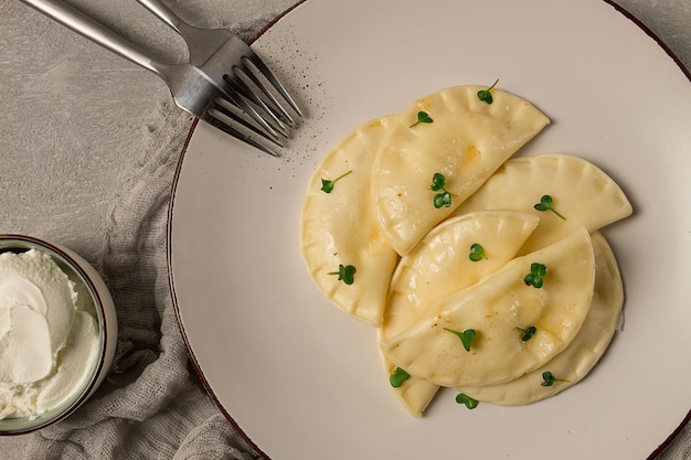 Pierogi a traditional dish of Polish cuisine dumplings top view closeup no people