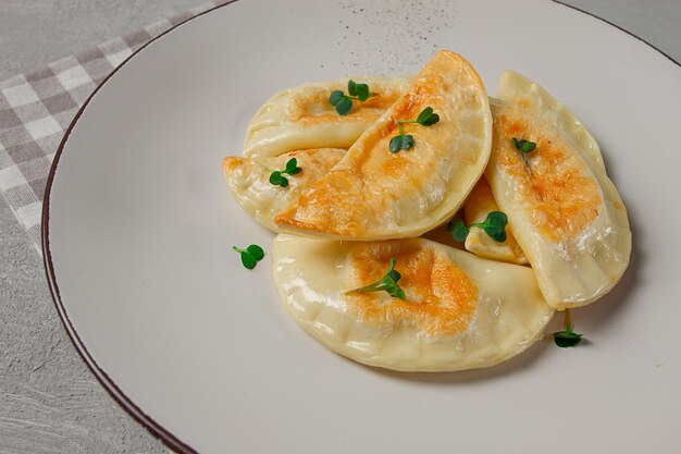 Pierogi a traditional dish of Polish cuisine dumplings top view closeup no people