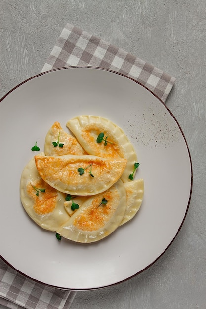 Pierogi a traditional dish of Polish cuisine dumplings top view closeup no people