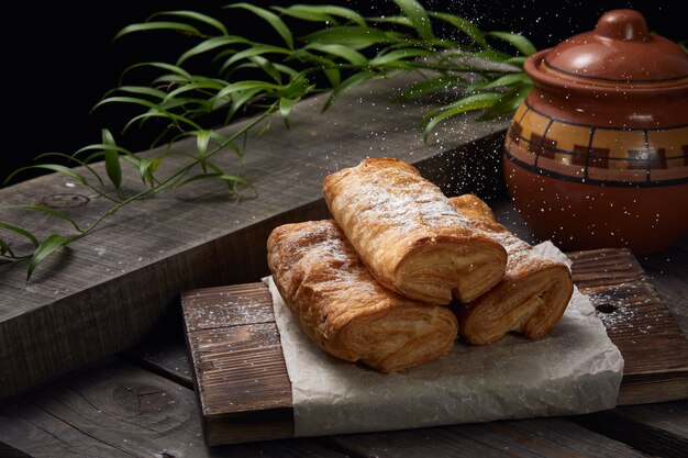 Pies with jam on a wooden table