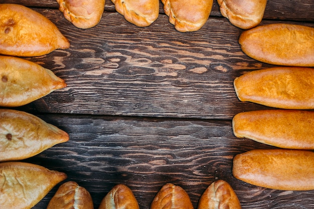 pies on a wooden background