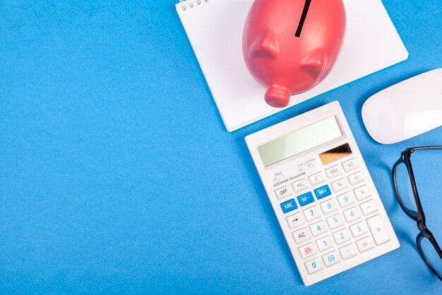 Piggy bank and calculator