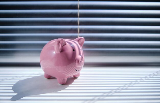 Piggy Bank Early Morning on Windowsill Accumulation and Success of Life.