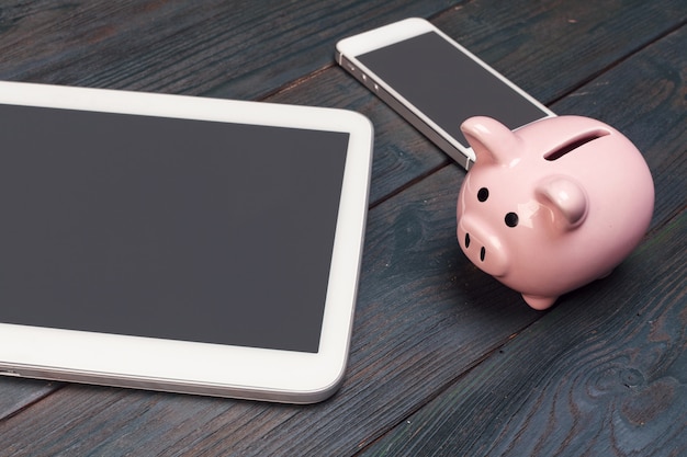 Piggy bank and modern devices