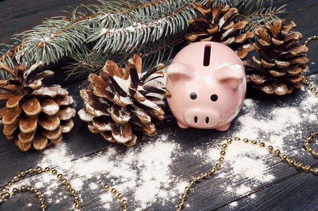 piggy bank with Christmas decoration. Christmas composition.