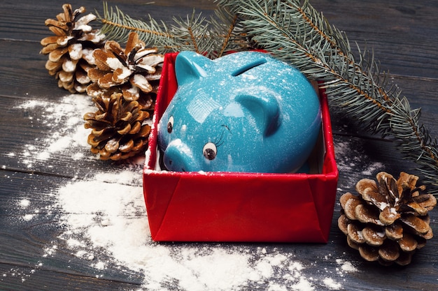 piggy bank with Christmas decoration. Christmas composition.