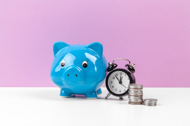 piggy bank with coin on the table