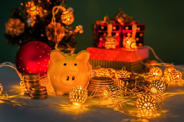 Piggy bank with coins on the table