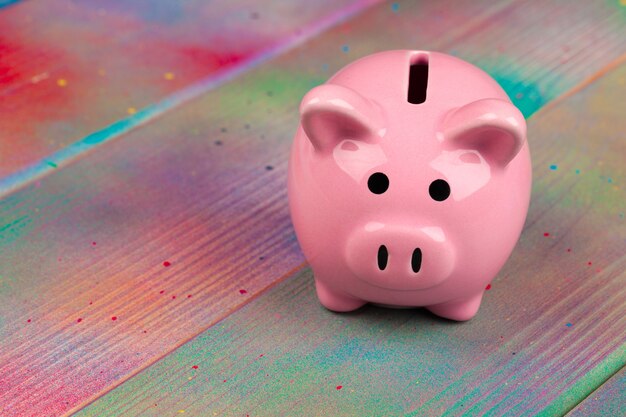 Piggy bank on wooden table