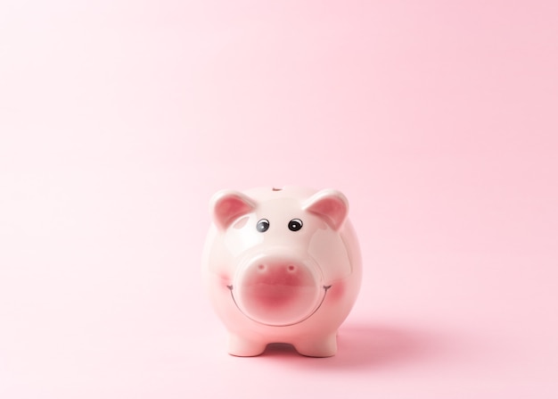 Piggybank isolated on pink