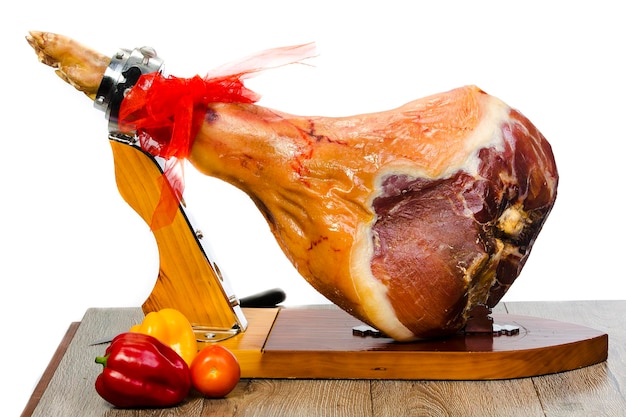 Photo pigs ham on a stand