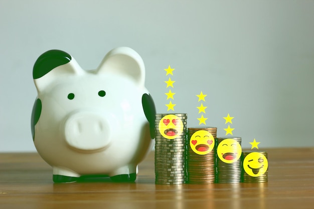 Pigy bank coin stack with emotion icon