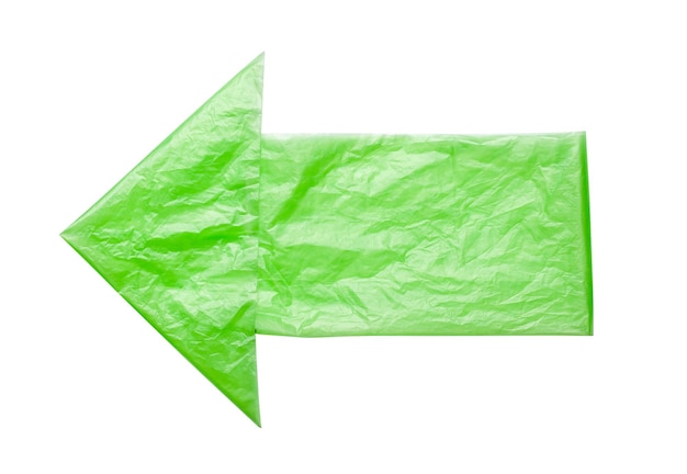 Pijl links van groene zakken geïsoleerd op een witte achtergrond Milieuvervuiling door wegwerpzakken