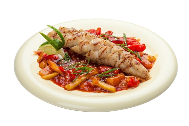 Pike perch with vegetables in sweet and sour sauce Asian cuisine On a white background